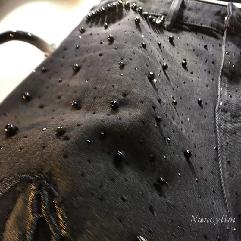 European 2025 Hollow Lace Jeans Women Summer New Black Lace Denim Pants Heavy Industry Beads Hot Diamond Denim Splicing Crochet