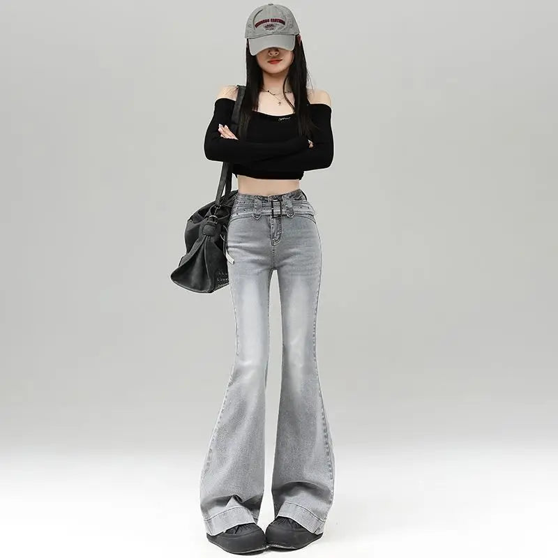 Light gray denim slightly flared pants for women with a distinctive belt, casual trendy fashion